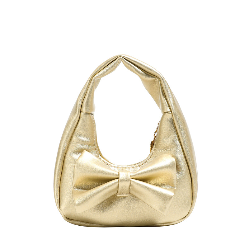 Dolce y lindo arco bolso de niña exquisita mini bolso de cambio de bebé 2025 bolso infantil transfronterizo