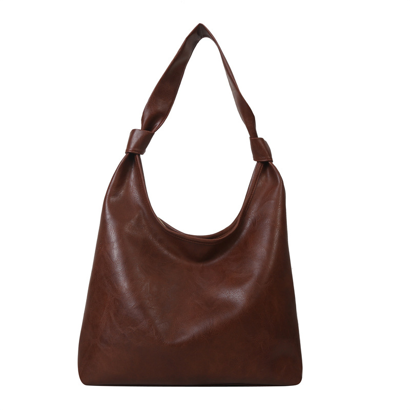 Moda europea y americana de alta textura retro bolsa de mujer 2023 invierno nuevo nicho diseño pu hombro bolsa de las axilas