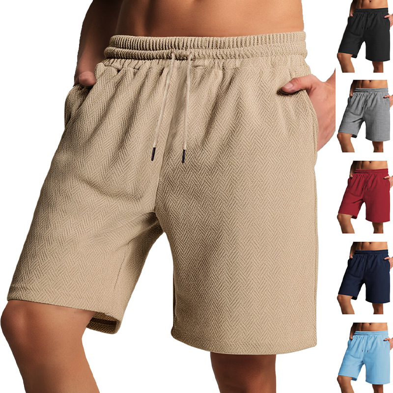 Europa y América transfronterizos TK paleta de verano relajado cómodo transpirable toallas Jacquard de color sólido pantalones cortos casuales de hombre