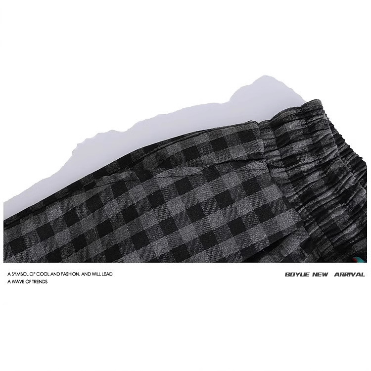 Retro pantalones cortos a cuadros negros y blancos para hombres y mujeres verano 2025 delgados de tirada deportivos casuales cinco pantalones delgados de piernas anchas