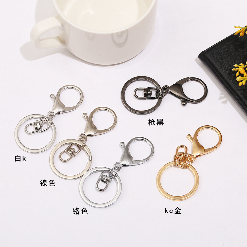 メーカーの現物亜鉛合金ロブスターバックル三点セットのキーホルダーは鉄の輪の8字のチェーンのアクセサリーの箱の部品を掛けて卸売りします。|undefined