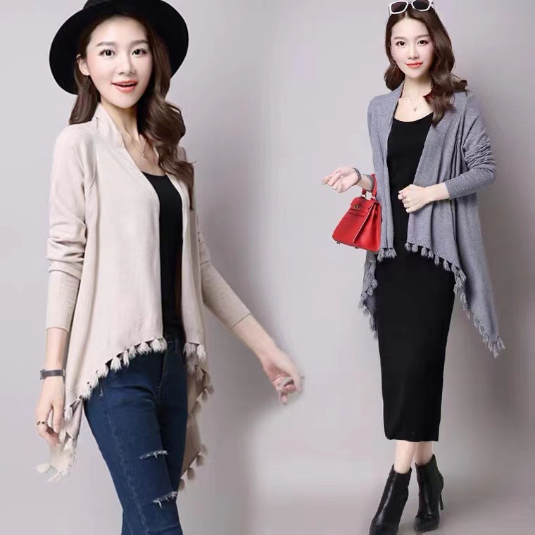 Popular europeo y americano nuevo punto cardigan mujeres de mediados de longitud de la borla Batwing camisa exterior chal capa