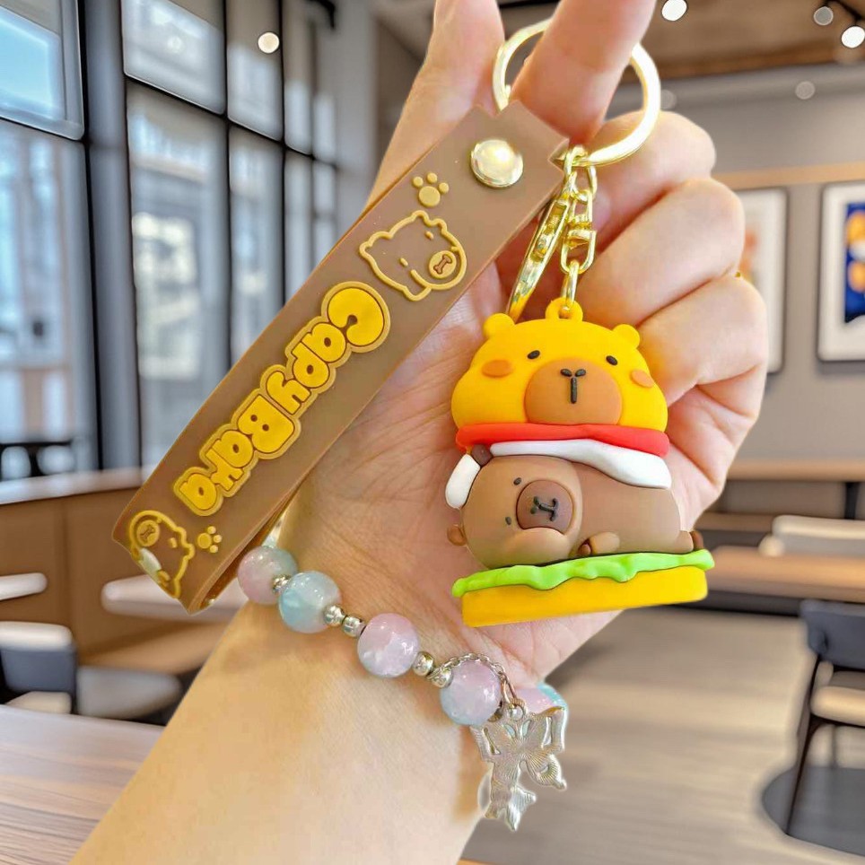 Nuevo llavero de Kapibala pareja mochila escolar colgante lindo capibara muñeca de PVC llavero de coche al por mayor