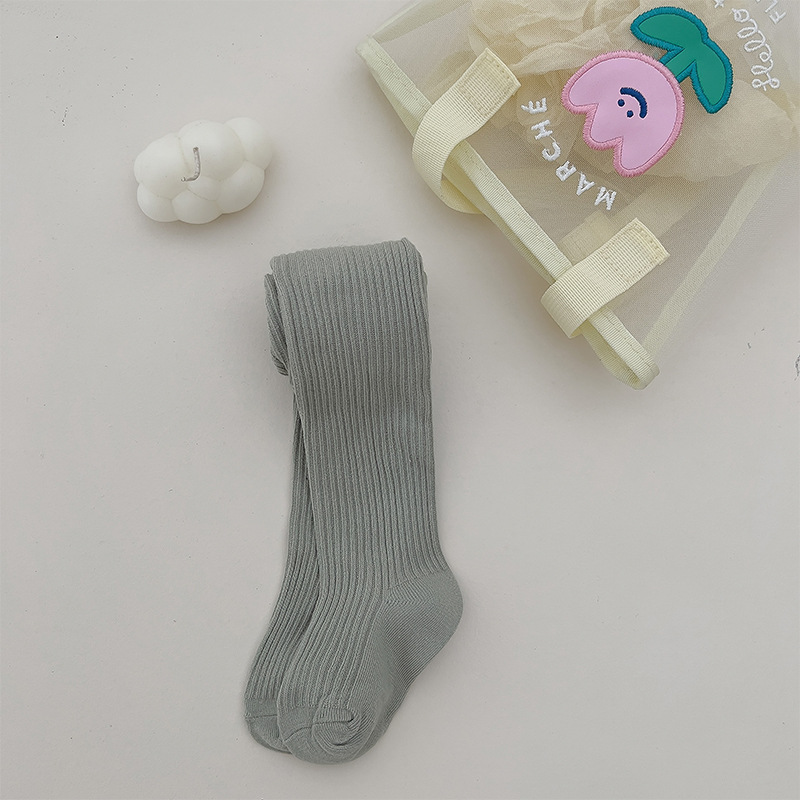 Nuevo color sólido rayas verticales polainas de las muchachas del otoño y el invierno estilo coreano ocasional los niños ropa exterior pantimedias blancas en stock