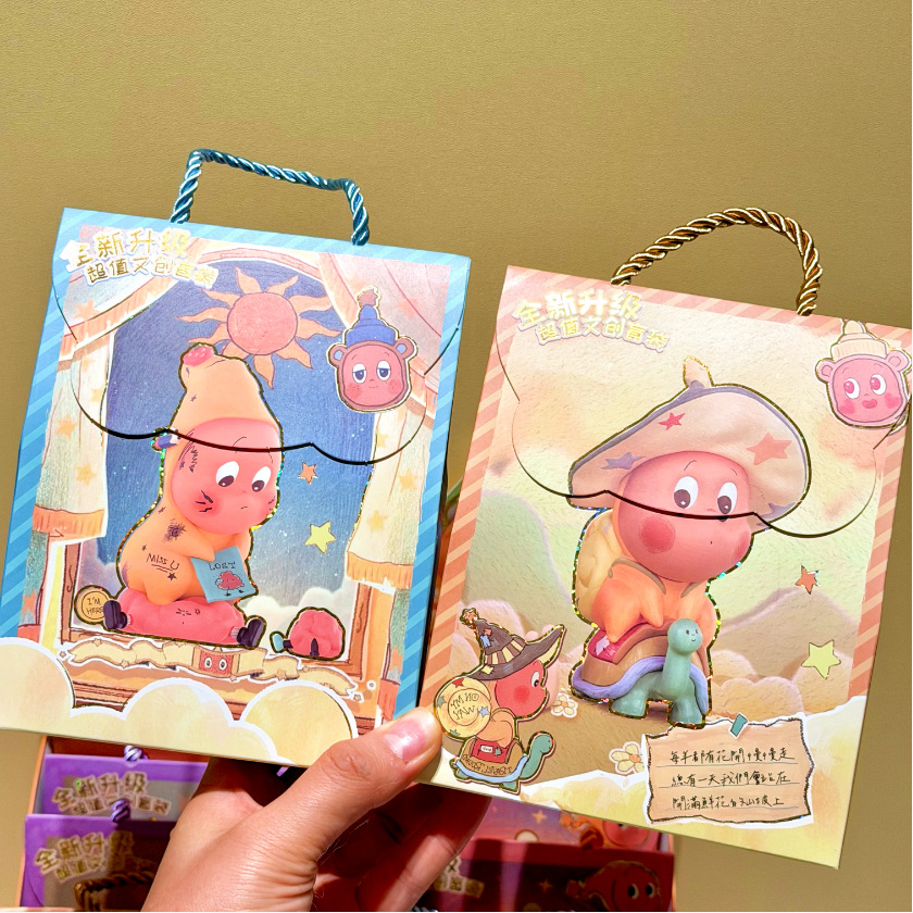 Nuevos productos de dibujos animados estrella humanista bolsas ciegas de alto valor de cara pegatinas insignia libro bolsas de regalo de caja ciega portátil