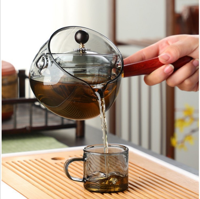 Nueva olla Xiaoyao 360 grados de vidrio borosilicato giratoria fabricante de té de vidrio juego de té traje hogar tetera