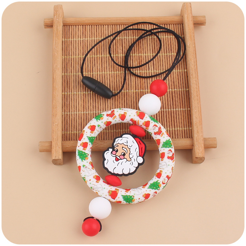 Bebé de dibujos animados de Navidad collar bebé creativo de silicona Santa Claus mordedura COLLAR COLGANTE hecho a mano