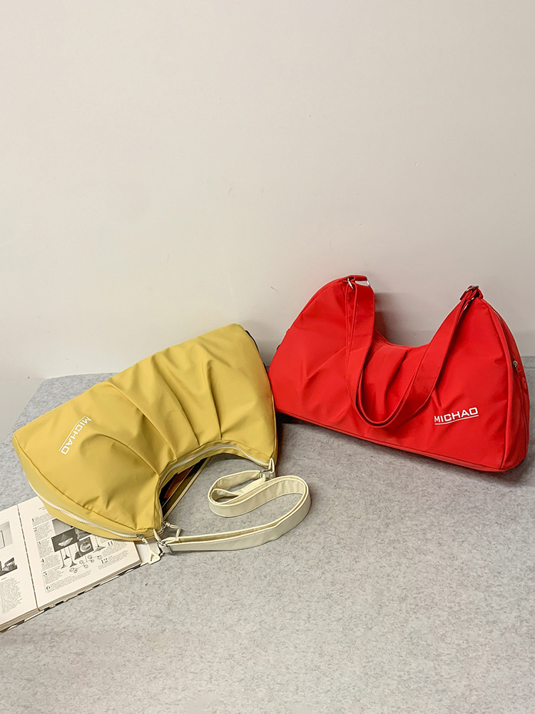 2025 nueva bolsa de equipaje para mujeres bolsa de excursión bolsa deportiva de gran capacidad bolsa de ejercicios bolsa de hombro ligera bolsa al por mayor