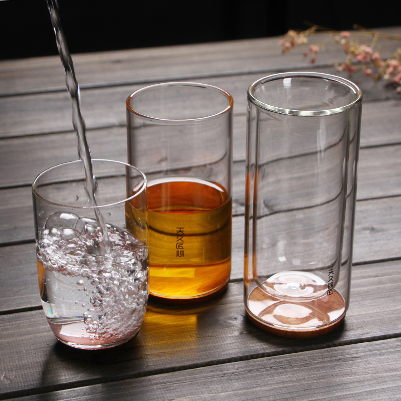 Vidrio transparente grueso resistente al calor inferior de madera aislamiento térmico de doble capa taza de té verde taza de agua creativa flor taza de té Tianjiu glass