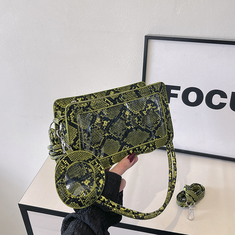 Serpiente de aire extranjero textura simple primavera 2025 nuevo temperamento diseño de moda mochila de hombro elegante bolso cuadrado