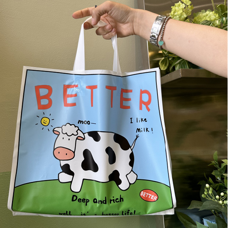 卡通可爱手提包装袋磨砂服装塑料儿童礼品袋子奶牛打包袋奶牛风
