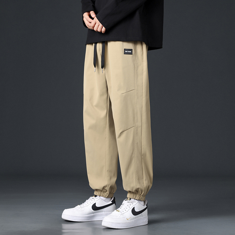 Pantalones de hombre primavera y otoño estilo americano de moda universal suelto y cómodo chaqueta deportiva, pantalones casuales para hombres