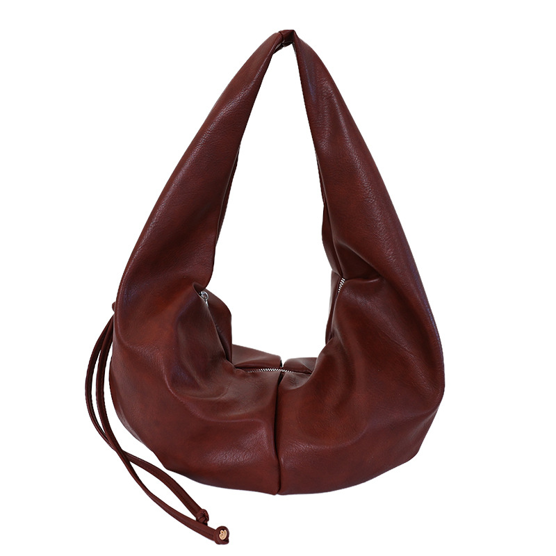 Nuevo paquete transfronterizo perezoso de viento creciente, temperamento femenino de alto nivel, bolso de brazo pequeño, simple y universal.
