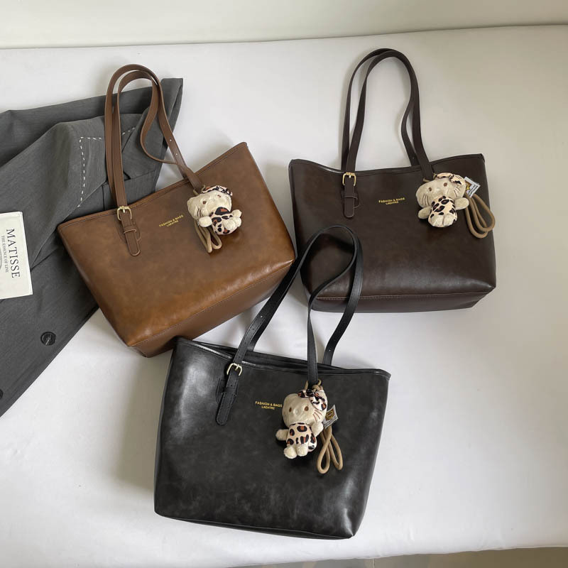 Bolsa de viaje retrógrada para mujeres 2026 otoño y invierno nuevo estilo versátil bolso de hombro de tendencia Maillard bolso de brazo
