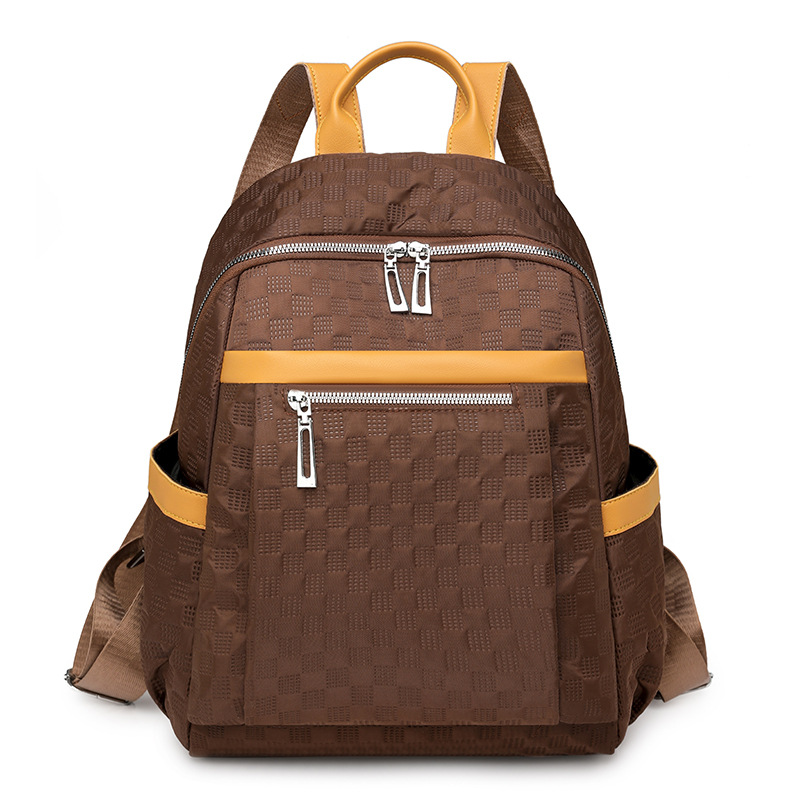 2024 otoño nuevas señoras mochila de nailon moda todo-fósforo viajes al aire libre contraste color mochila de gran capacidad al por mayor