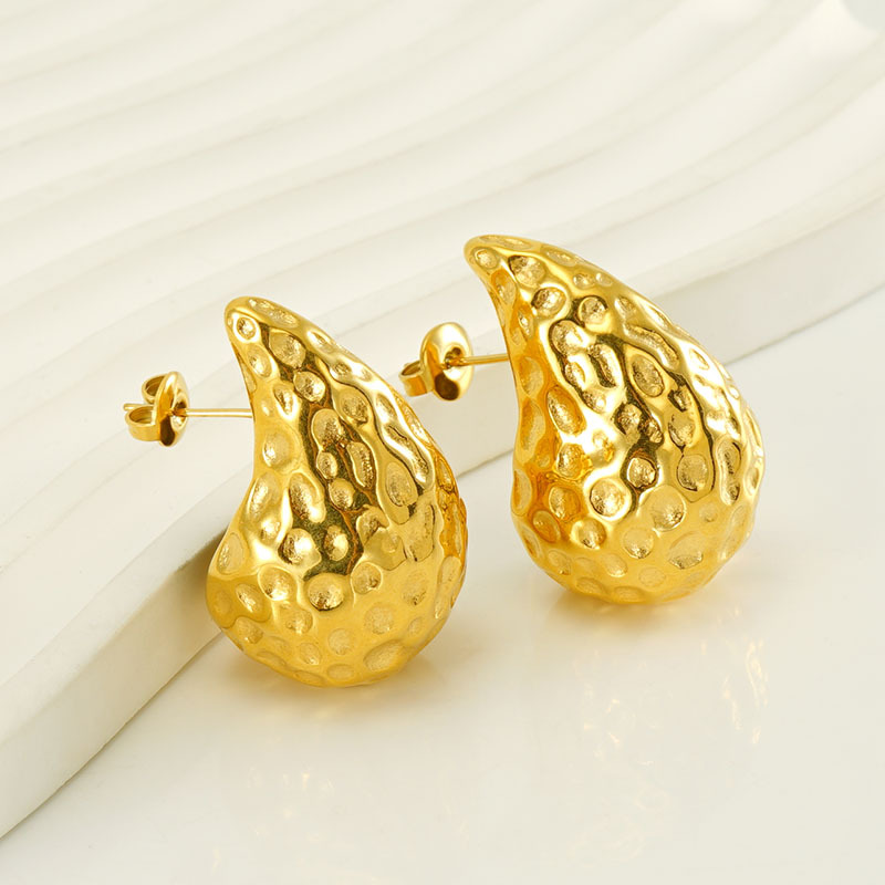 Diseño avanzado europeo y americano sentido 18K oro rechoncho gota de agua pendientes de acero de titanio INS moda todo partido pendientes geométricos al por mayor