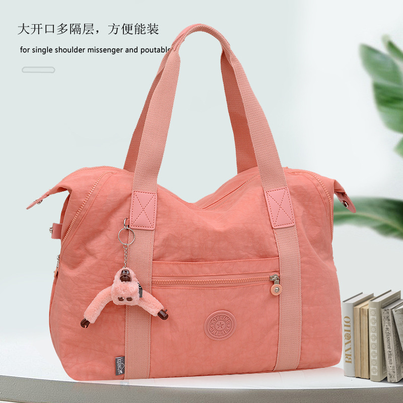 Bolsa de viaje Paño lavado de gran capacidad simple y ligero viaje corto yoga bolsa de fitness bolsa de equipaje colgante de mono