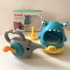 Shark blows bubbles + hand-cranked elephant (color box)