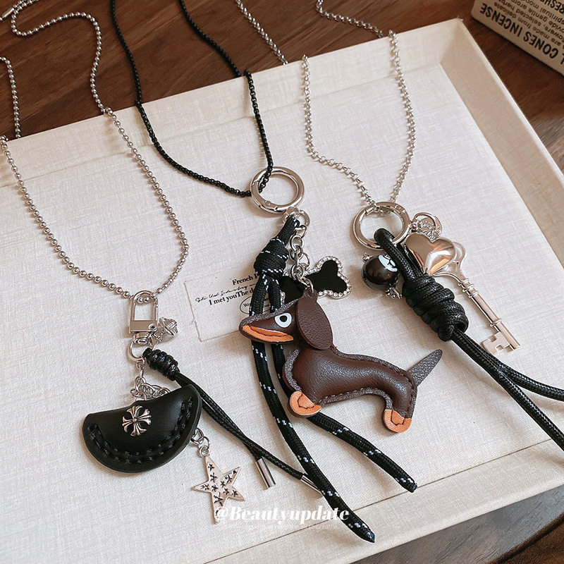Collar de llavero de cachorro de color café, cadena de suéter de diseño de nicho, accesorios de joyería de moda de alta gama femenina