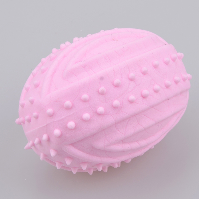 Amazon nuevo TPR espuma leche sabor púas sólido rugby mascota juguete mordedura juguete molar