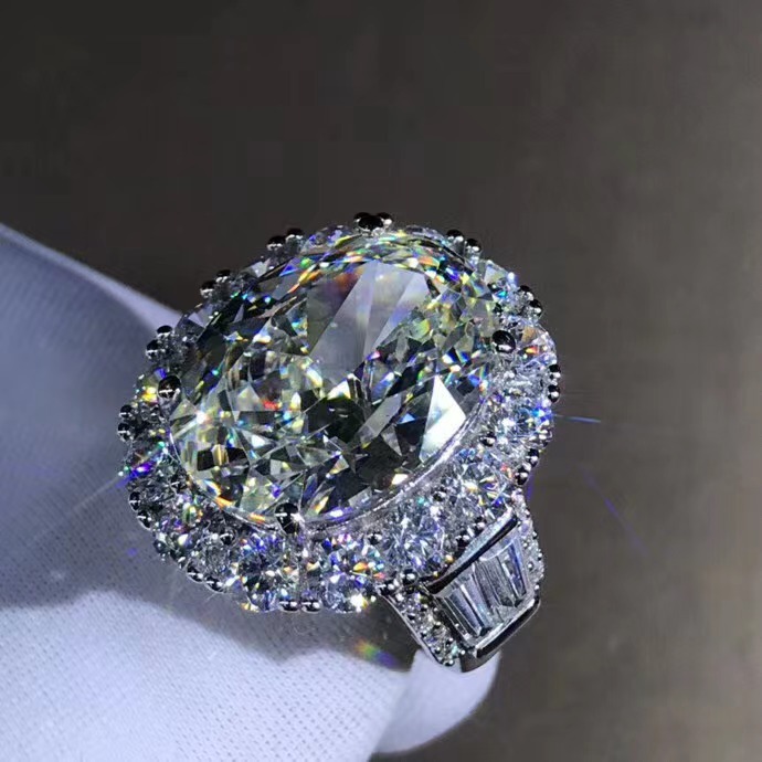 Plata de ley galvanizado de cinco capas de espesor con incrustaciones de platino importado Diamante de alto carbono 10 quilates gran paloma huevo corte Rosa G anillo de color