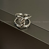 Retro fashionable ring, silver 925 sample, on index finger