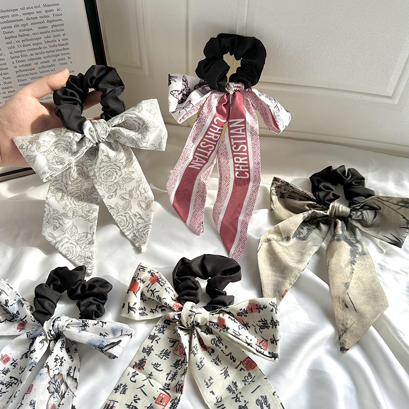 Anillo de cabello de arco femenino retro elegante correa francesa temperamento de alta sensación de impresión de anillo de intestino suave tocado versátil