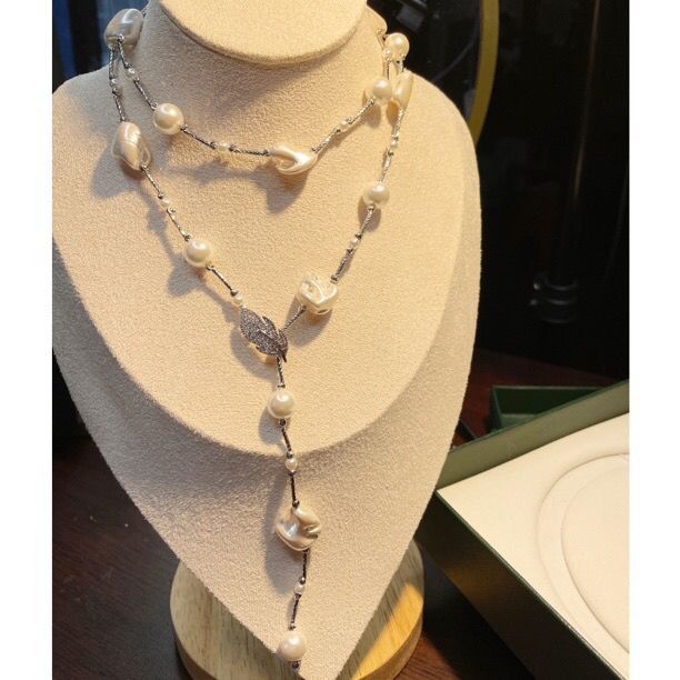 Barroco perla larga cadena de suéter cadena de collar cadena de clavícula un temperamento de uso múltiple 758 cuero artificial