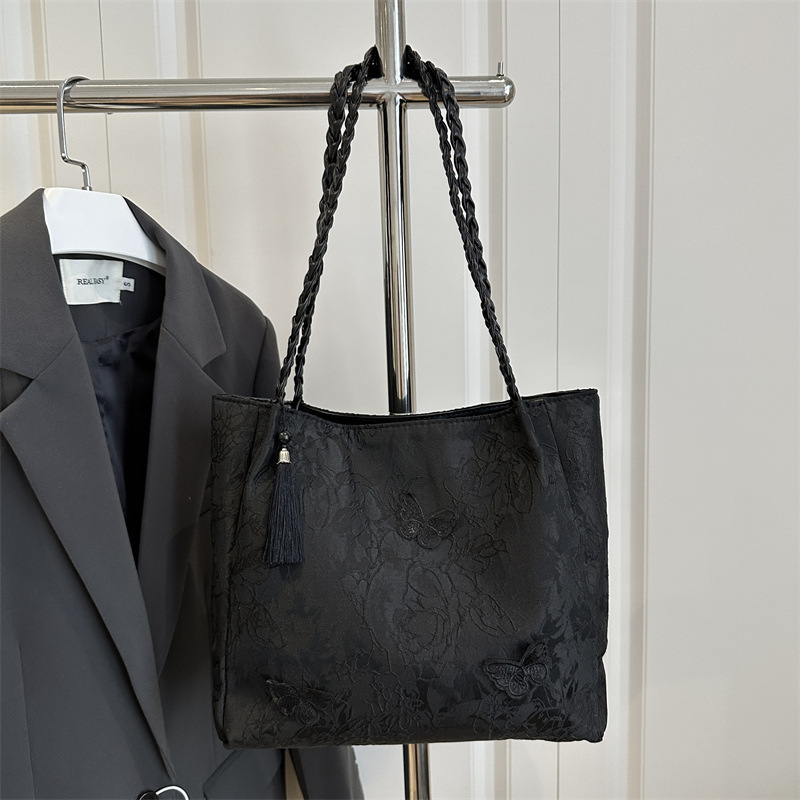 Bolso de viaje de seda de mariposa de alta calidad de nicho 2025 verano nuevo bolso de mujer simple de gran capacidad nuevo estilo chino