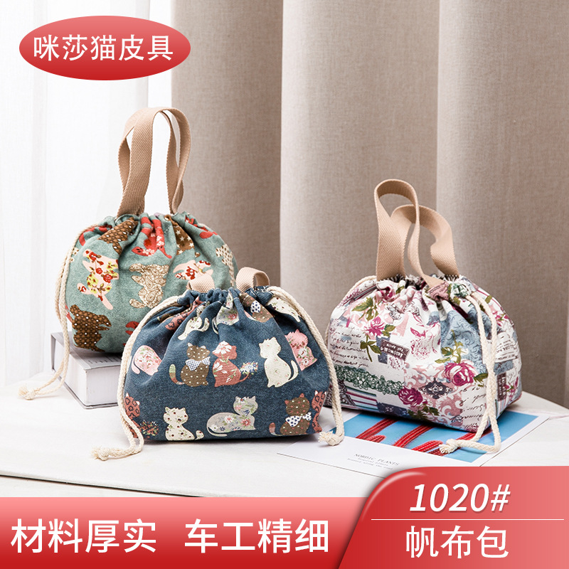 日式抽绳帆布女包小拎包休闲零钱包手提包饭盒包印花百搭布艺小包