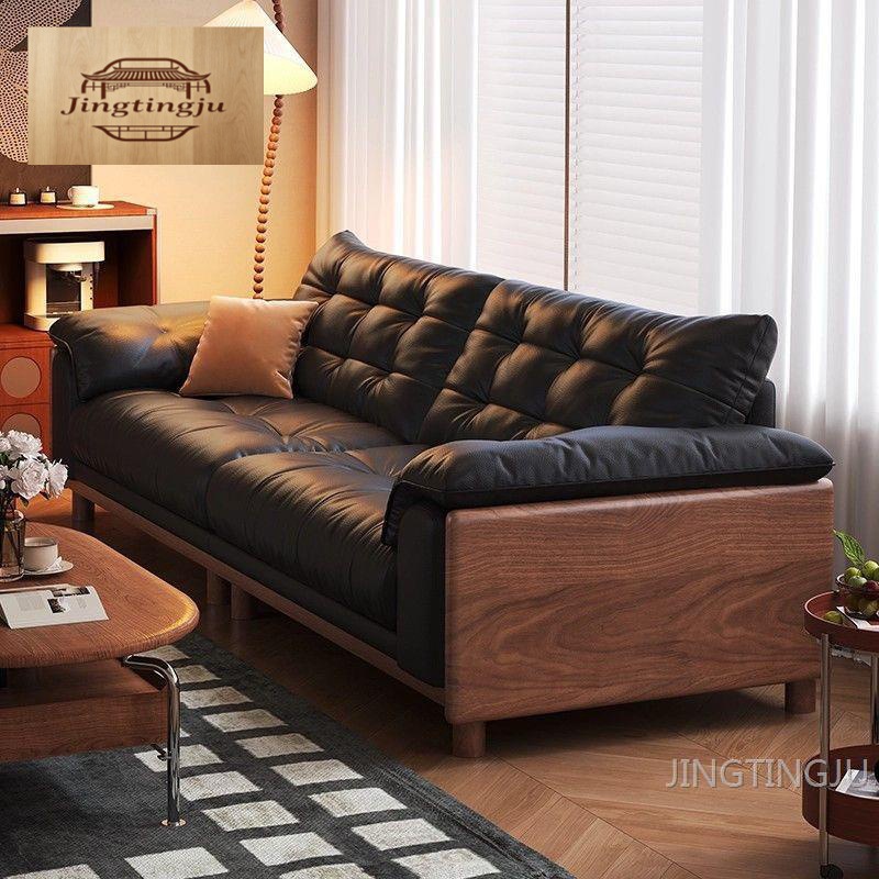 Vintage-style living room leather sofa, retro 2026 new model, top-grain cowhide, small-sized cloud black solid wood sofa