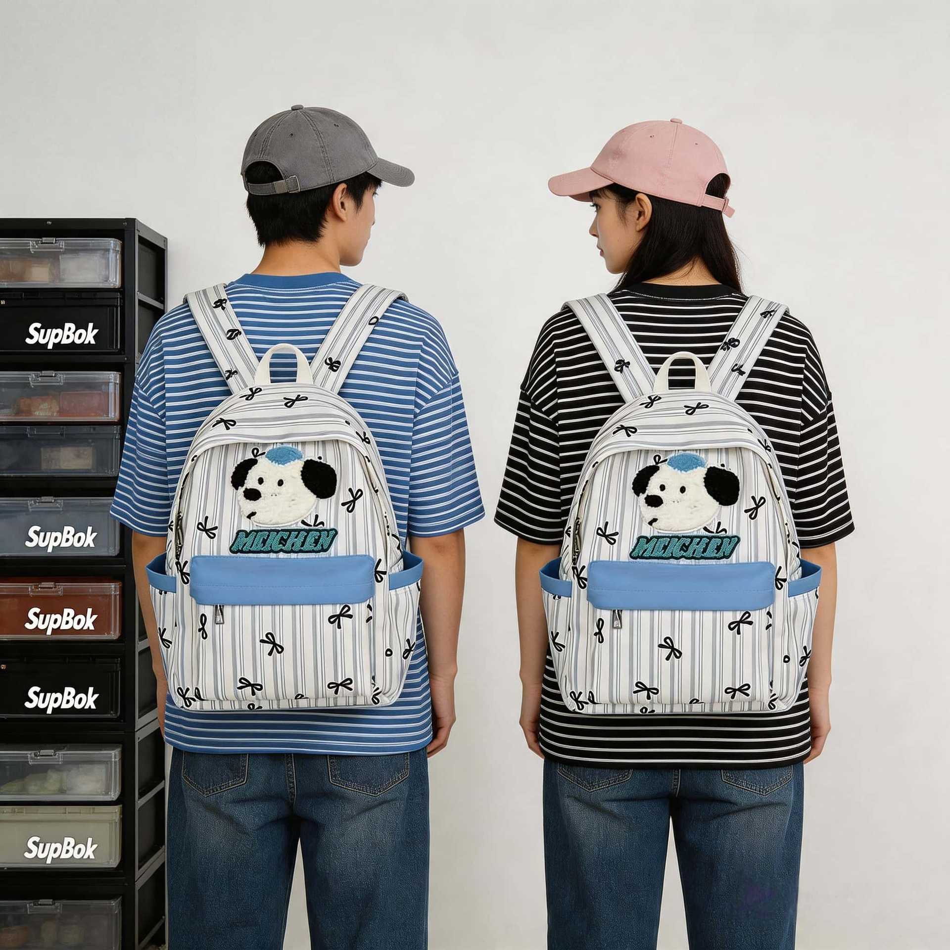 Limpieza banda de dibujos animados mochila de perros pequeños estudiantes frescos versátiles mochila de gran capacidad arco mochila de chicas
