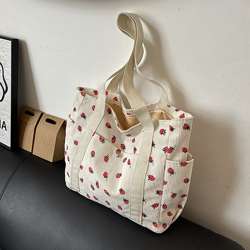 Coreano ins chica impresión de fresas viaje mochila 2025 nueva gran capacidad velcro bolsa de mano casual