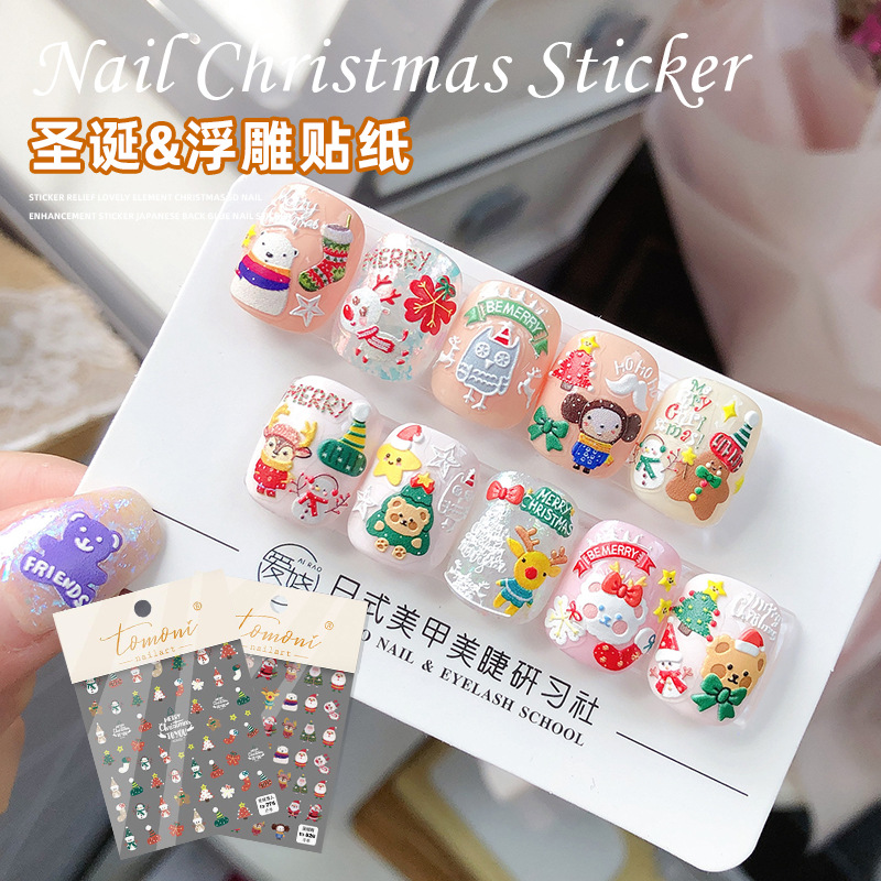 Pegatinas de uñas decorativo pequeño patrón Navidad Santa Claus Otoño e Invierno alivio de dibujos animados copo de nieve tridimensional Internet celebridad pegatinas de uñas