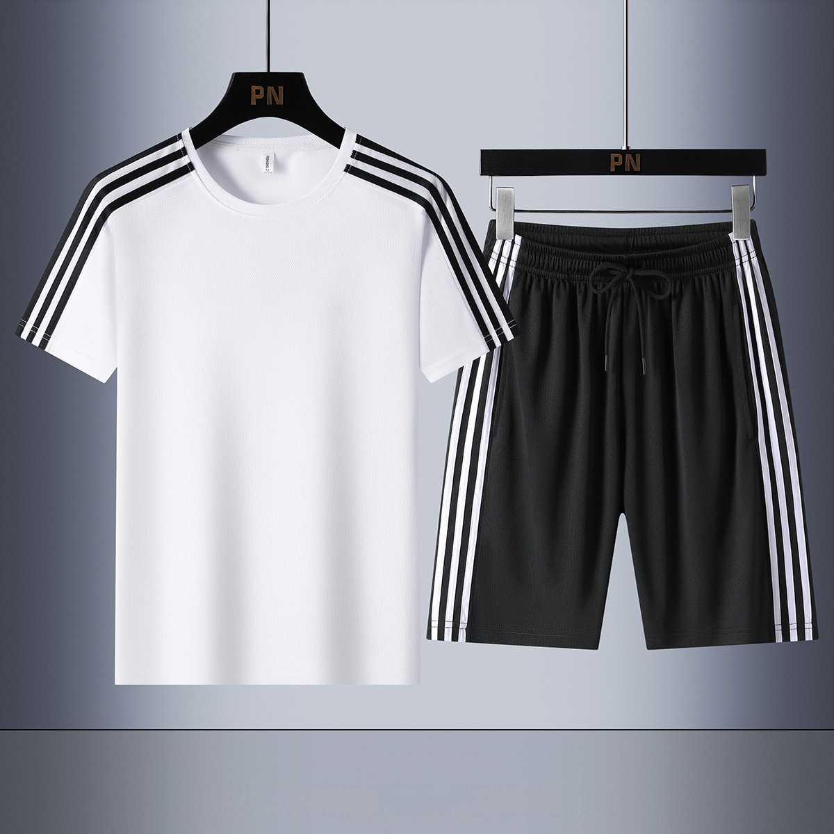 Traje deportivo de tres barras de verano transfronterizo para hombre suelto y versátil de manga corta para hombre estilo delgado clásico corriendo de dos piezas de gran tamaño