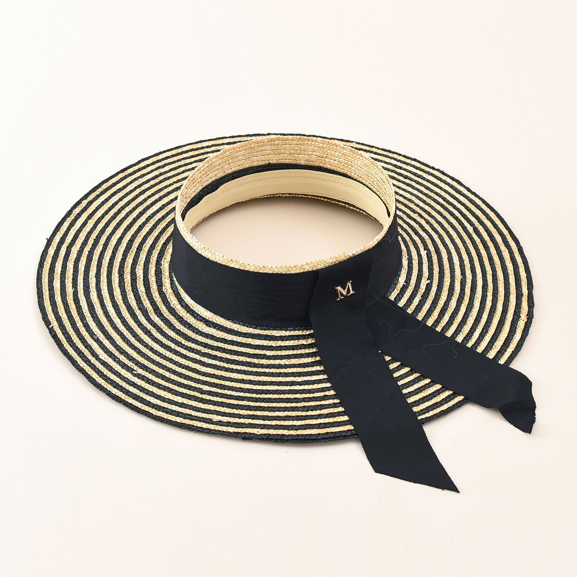 Estilo europeo y americano de las mujeres de verano francés retro hepburn elegante paja ala grande sombrero de paja superior vacío sombrero de playa de vacaciones a prueba de sol