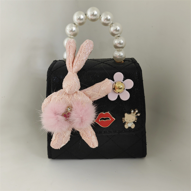 2025 primavera y verano estilo caliente moda casual niños dulces bolsa de gelatina mini bolso de mensajero de un solo hombro variedad al por mayor