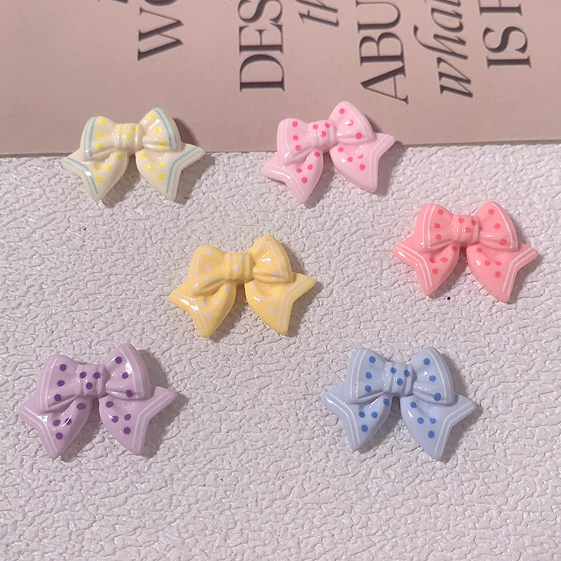 Cartoon brillante color con puntos arco corbata clip de cabello cuerda clip de cabello pegamento de crema DIY accesorios de resina de hebilla