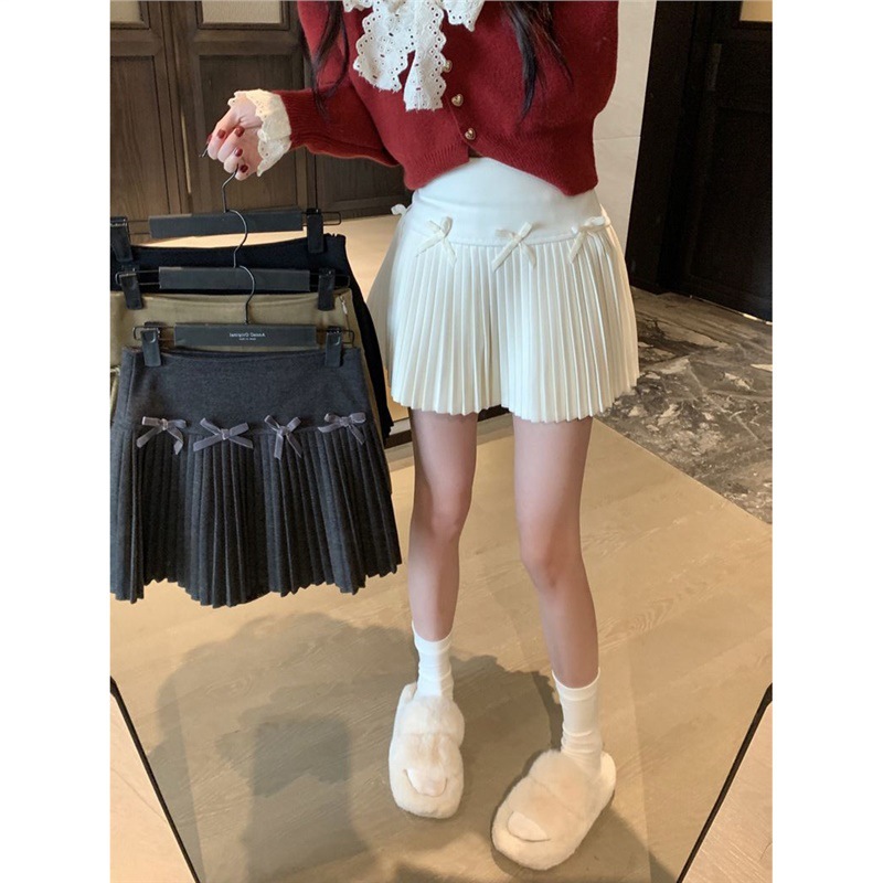 毛呢半身裙蝴蝶结黑色百褶裙女2023冬季高腰显瘦A字裙辣妹短裙子