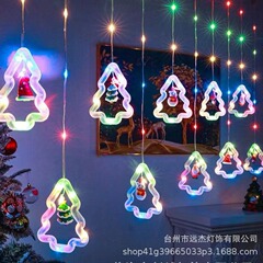 国境を越えた新製品クリスマスライトはサンタクロースアニメの形のカーテンライトの部屋のショーウインドーにledカラーライトを飾っている