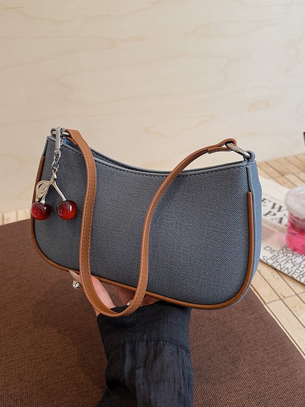 Colgante de cereza bajo la axila bolso de mano 2025 otoño bolso mahjong simple mochila casual mini diapositiva