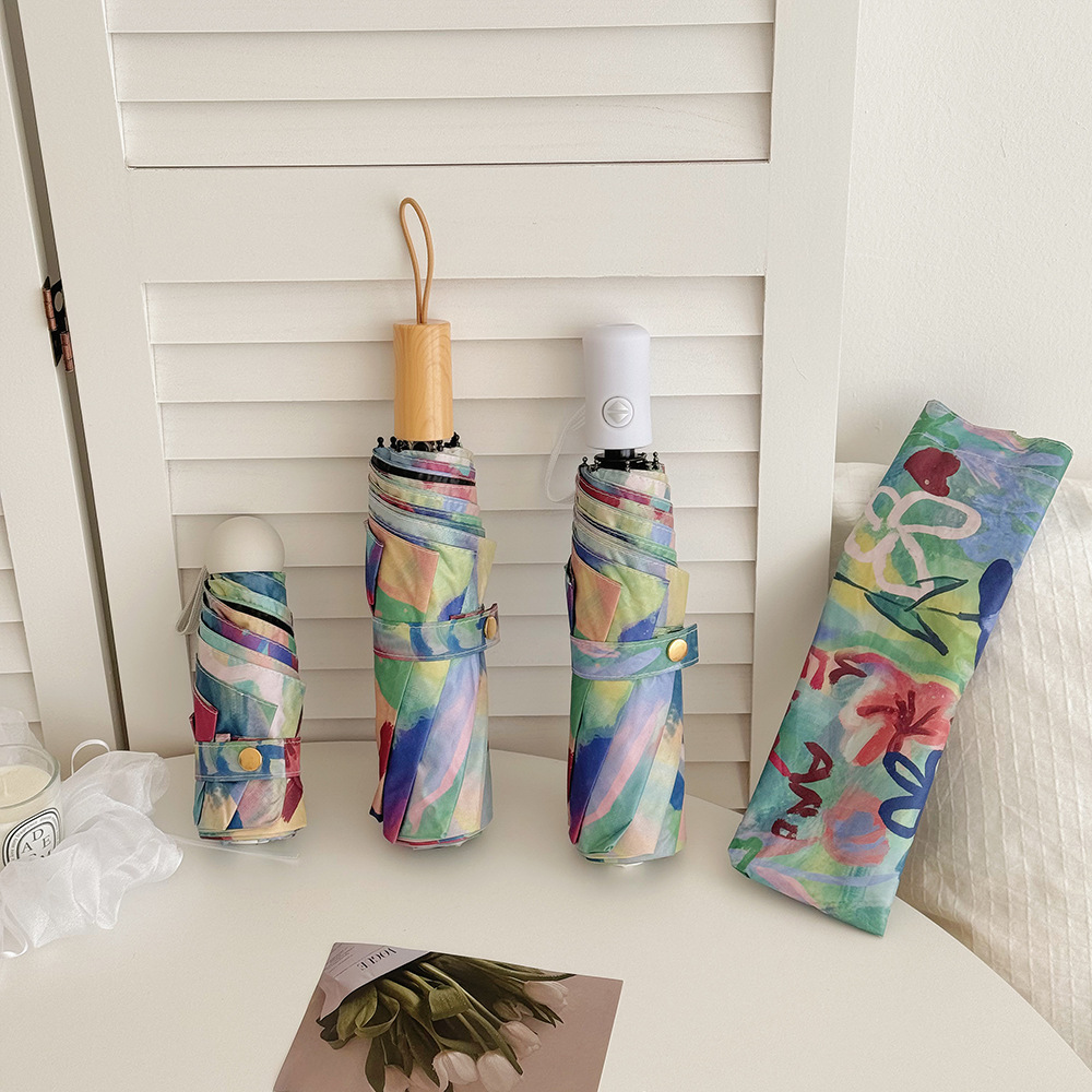 クロスボーダー日韓自動パラソル女性小清新色日焼け止め傘晴雨両用黒ゴム五つ折り日傘