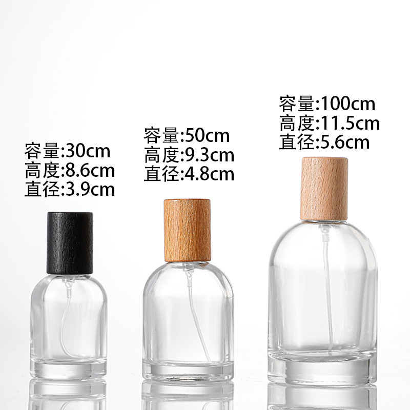 30ml; botella + spray negro + tapa de madera negra; vidrio