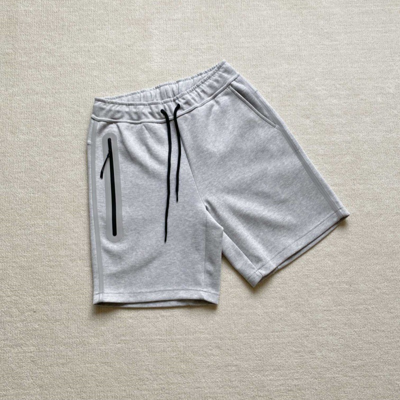 Pantalones cortos deportivos pantalones casuales sueltos de algodón fino de verano para hombres