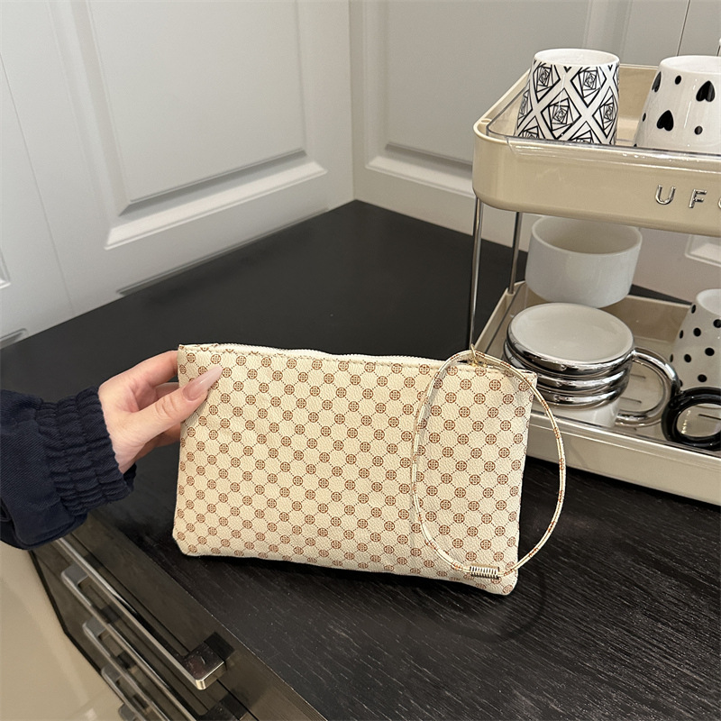 Impresión cuadrada otoño e invierno bolsas de mano casuales universales para mujeres de alta calidad temperamento simple nicho de moda bolsas de cena