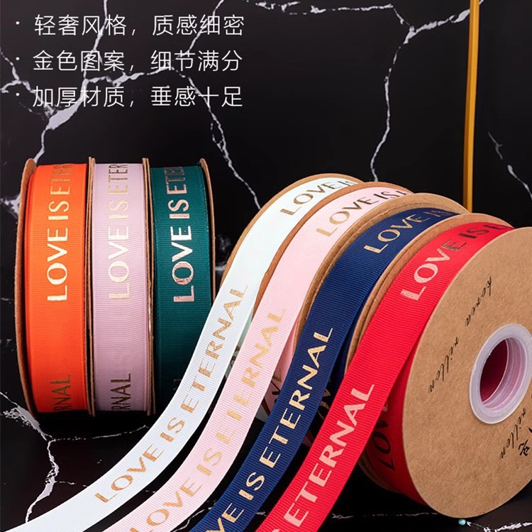 2,5 cm dorado cinta tienda de flores material de DIY floral al por mayor de la flor de poliéster Inglés carta envuelta cinta de la flor