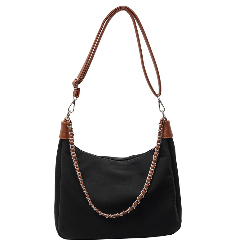Bolso de axila simple de comercio exterior femenino 2025 nueva versión coreana de la bolsa de mensajero de viaje de trabajo bolso de alta capacidad de ocio