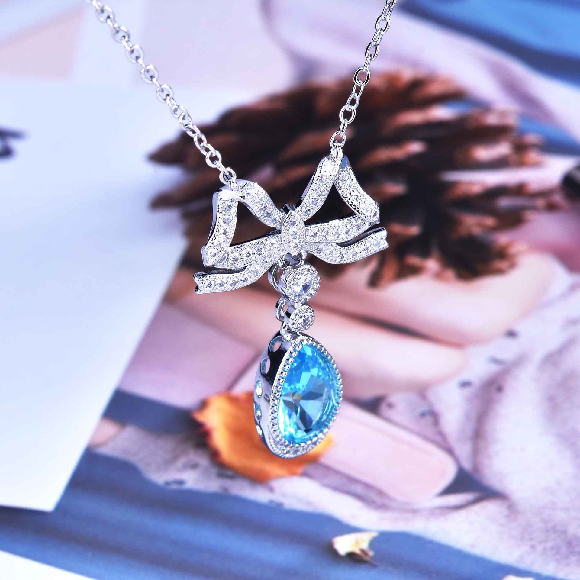 Imitation Aquamarine Topaz Necklace Bowknot Clavicle Chain Color Morganite Pendant Necklace display picture 9