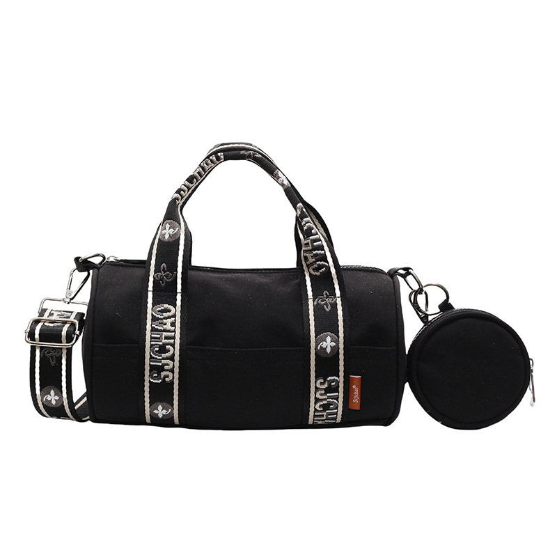 Oxford tela de contraste de color ligero bolso cilíndrico de mano casual para mujeres 2025 nuevo alto valor ocio transporte de viaje mochila