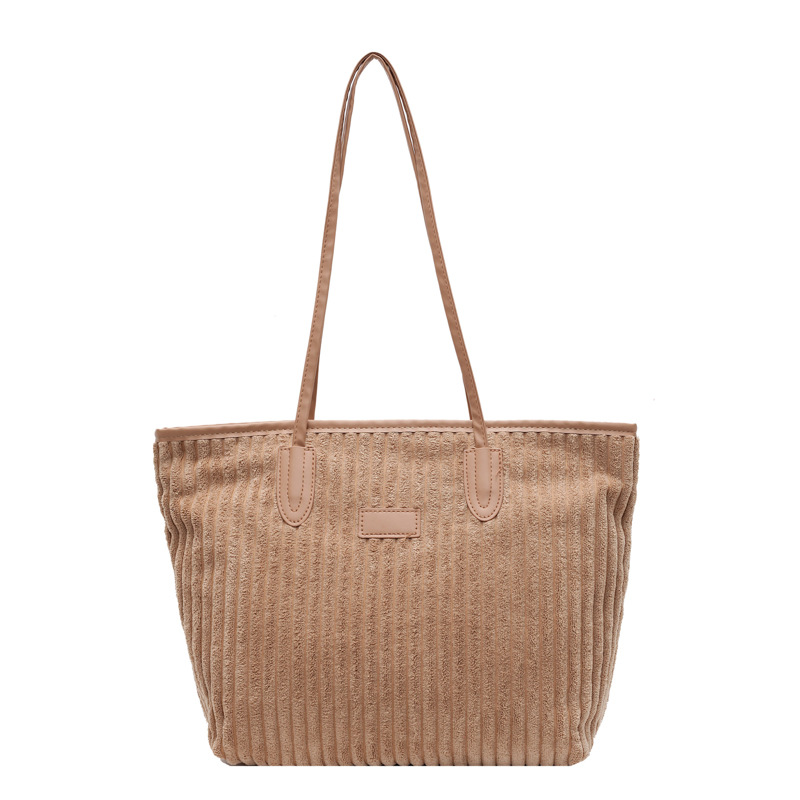 Verano 2024 invierno de gran capacidad de meandruño nuevo nicho simple de viaje de mano bolsa de hombro para mujeres